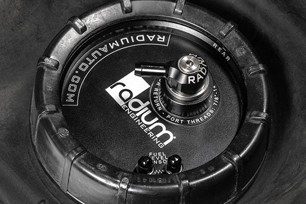 Close-up of a Radium Engineering automotive component on a dark background