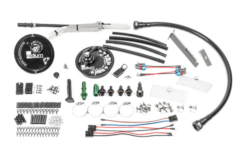 Automotive parts and accessories laid out on a white background