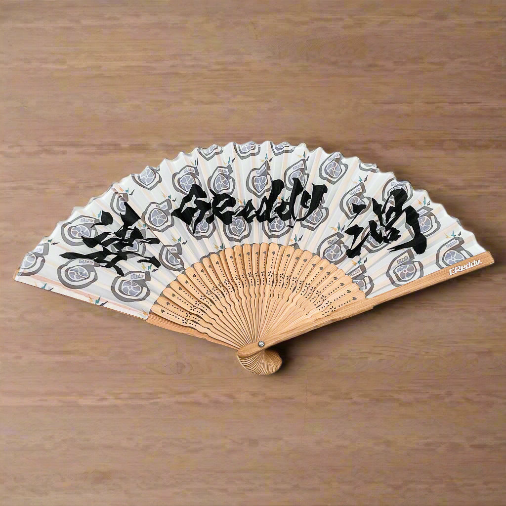 Limited Edition GReddy Folding Fan on Wooden background