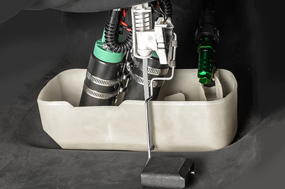 Close-up of a mechanical device with green and black components on a dark background