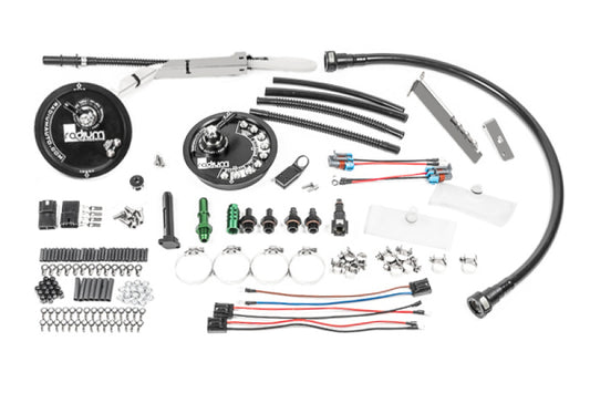 Automotive parts and accessories laid out on a white background